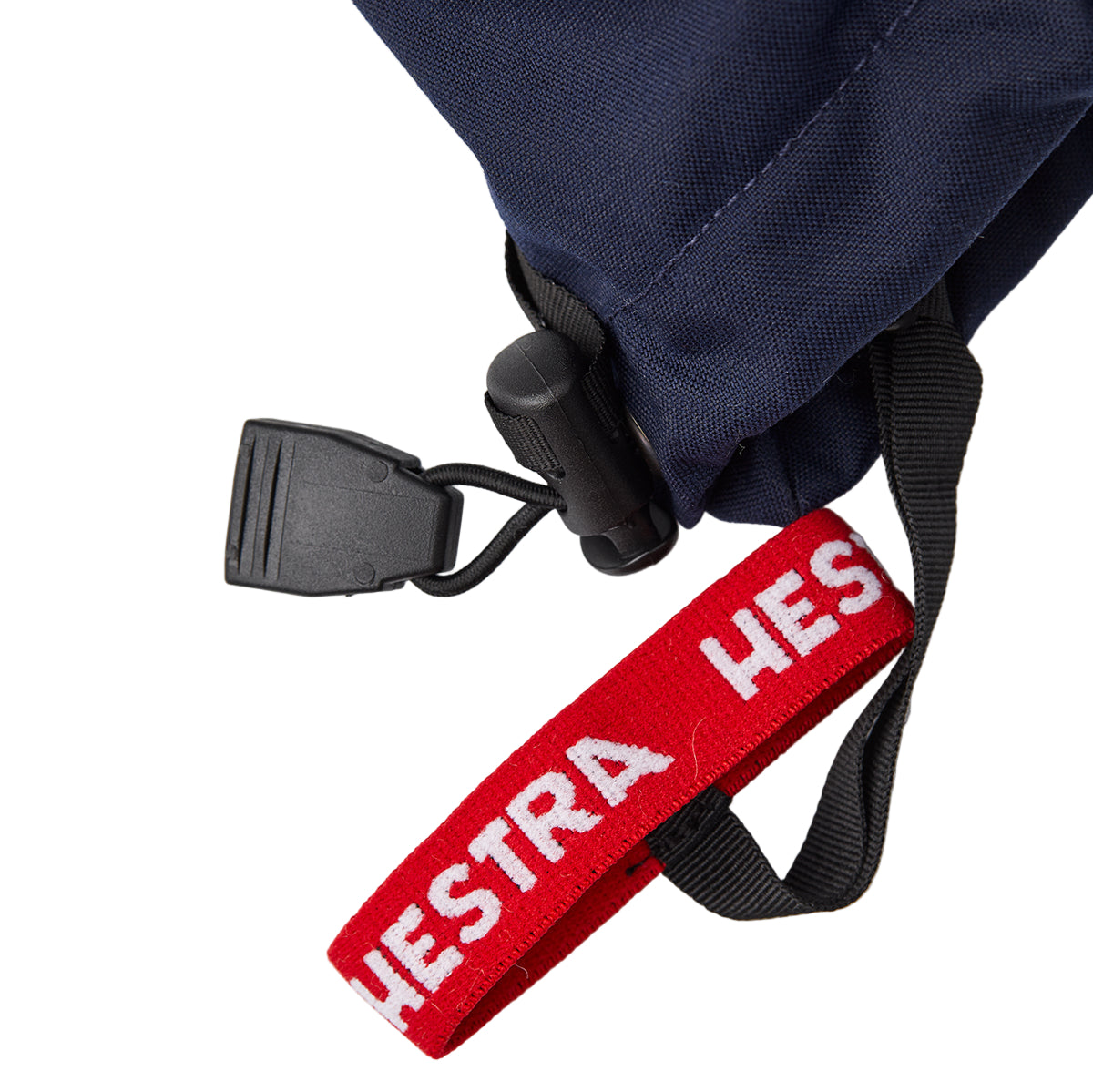 Red strap with 'HESTRA' branding on a white background