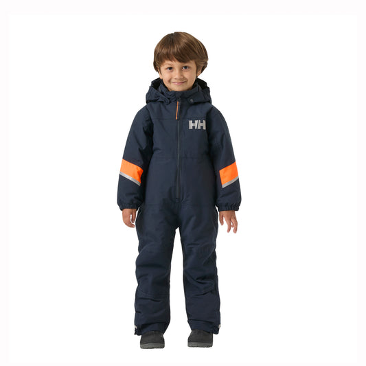 A young child wearing a navy blue Helly Hansen snowsuit with orange and white sleeve stripes, standing against a plain white background.