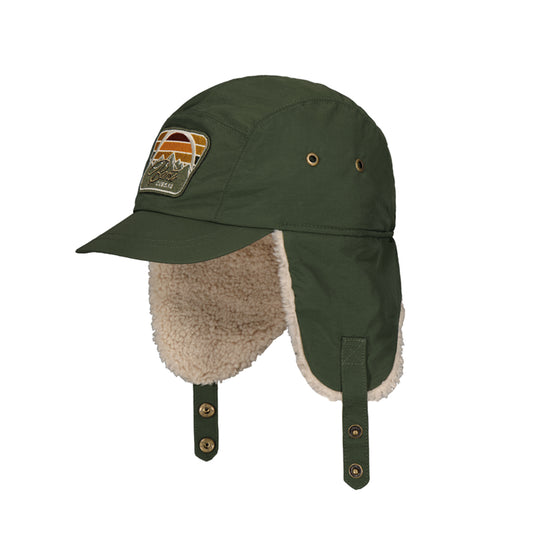 Green winter hat with ear flaps and a patch on a white background