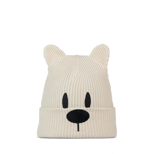 Cream kids knit hat with bear ears and face on a white background