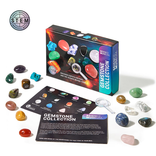 Science Museum gemstone collection with box, stones, and card on a white background