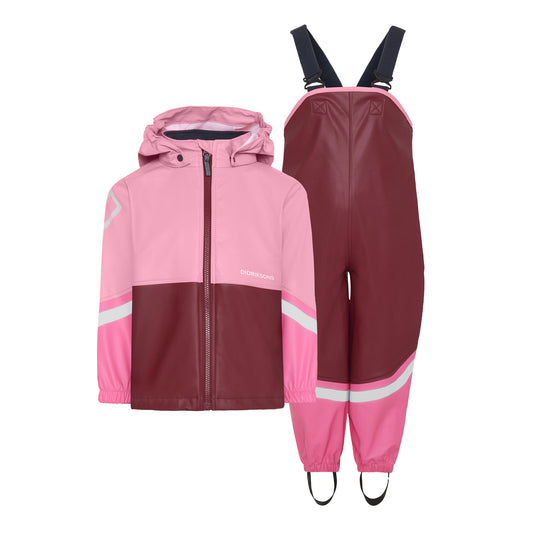Pink and maroon raincoat and pants set on a white background