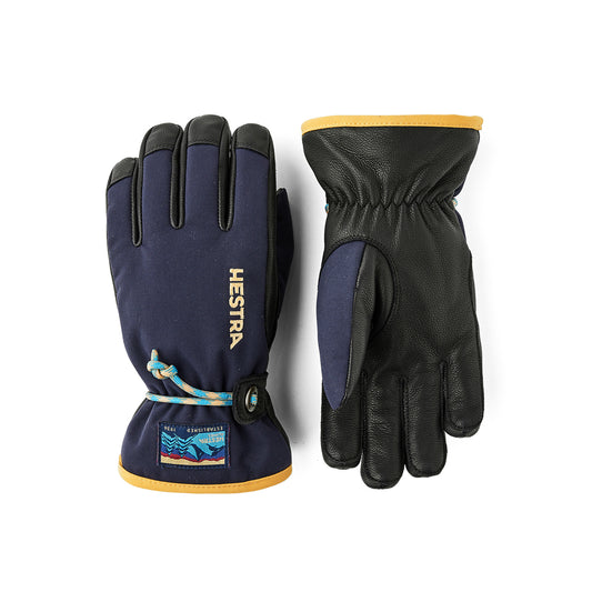 Pair of Hestra youth gloves on a white background