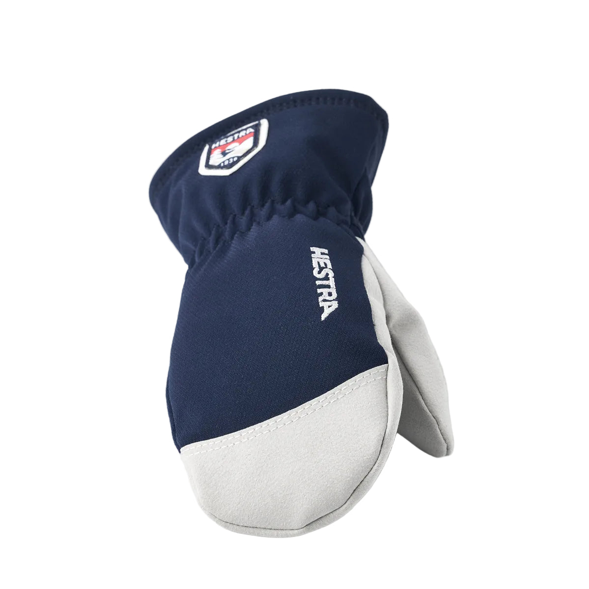 A single Hestra brand winter mitten in navy blue and light gray, shown on a clean light gray background.