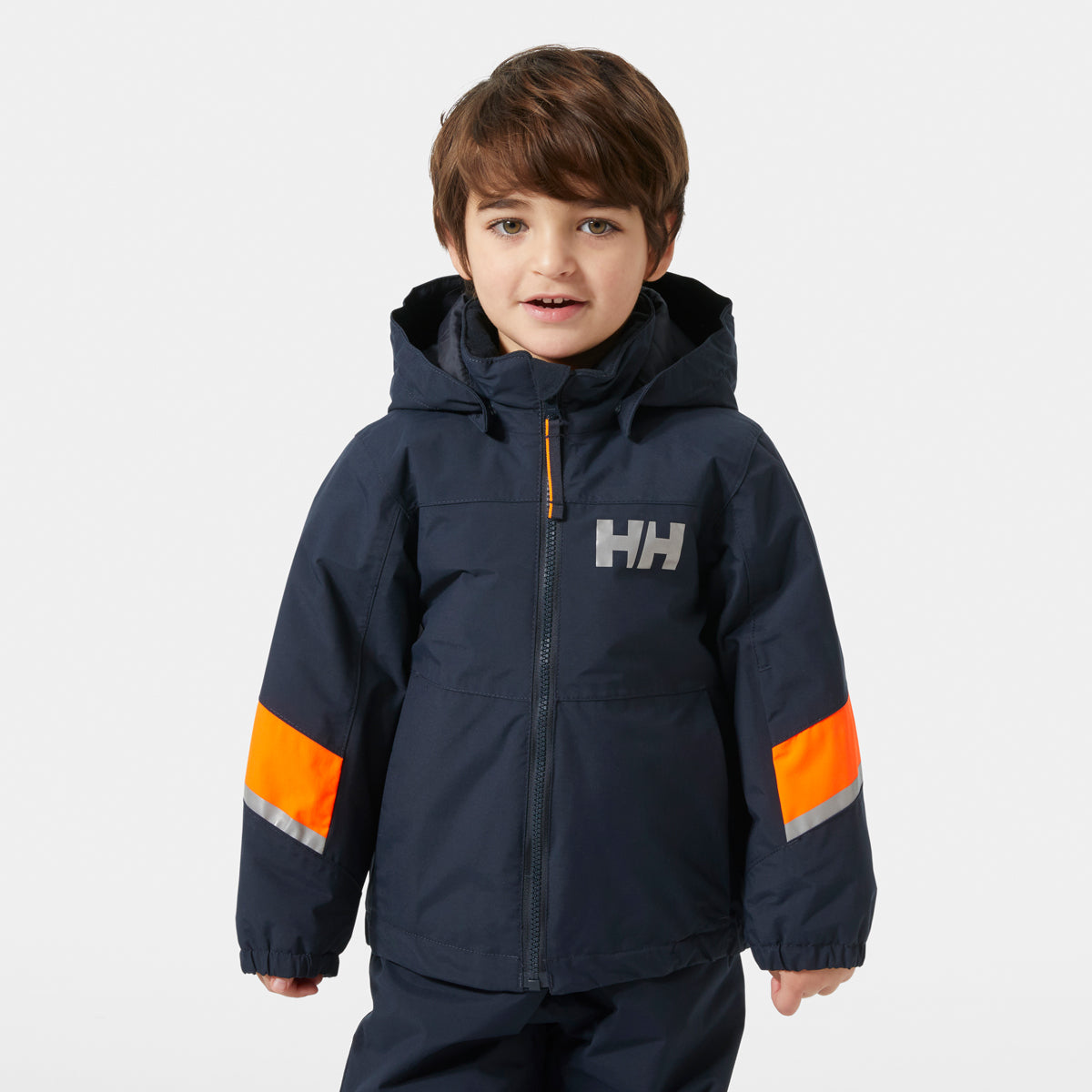 Child wearing a navy jacket with orange accents and a visible brand logo on a white background