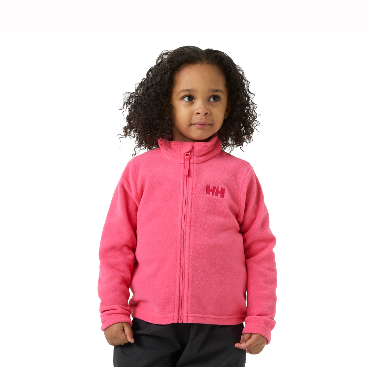 Girl wearing pink fleece jacket on white background