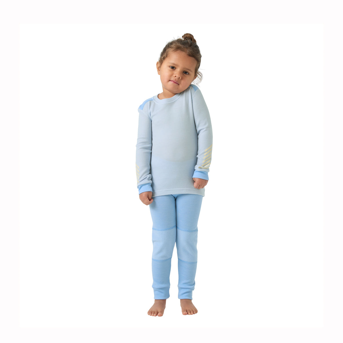 Girl wearing blue thermal top and leggings on white backround