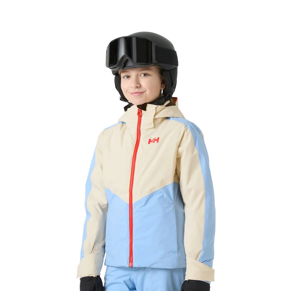 A child wearing a light blue and beige Helly Hansen ski jacket, matching pants, a black helmet, and goggles, photographed against a solid white background.