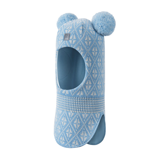 Blue patterned toddler balaclava with pom-poms on a white background