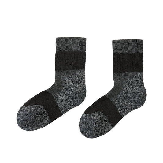 Pair of black and gray socks on a white background