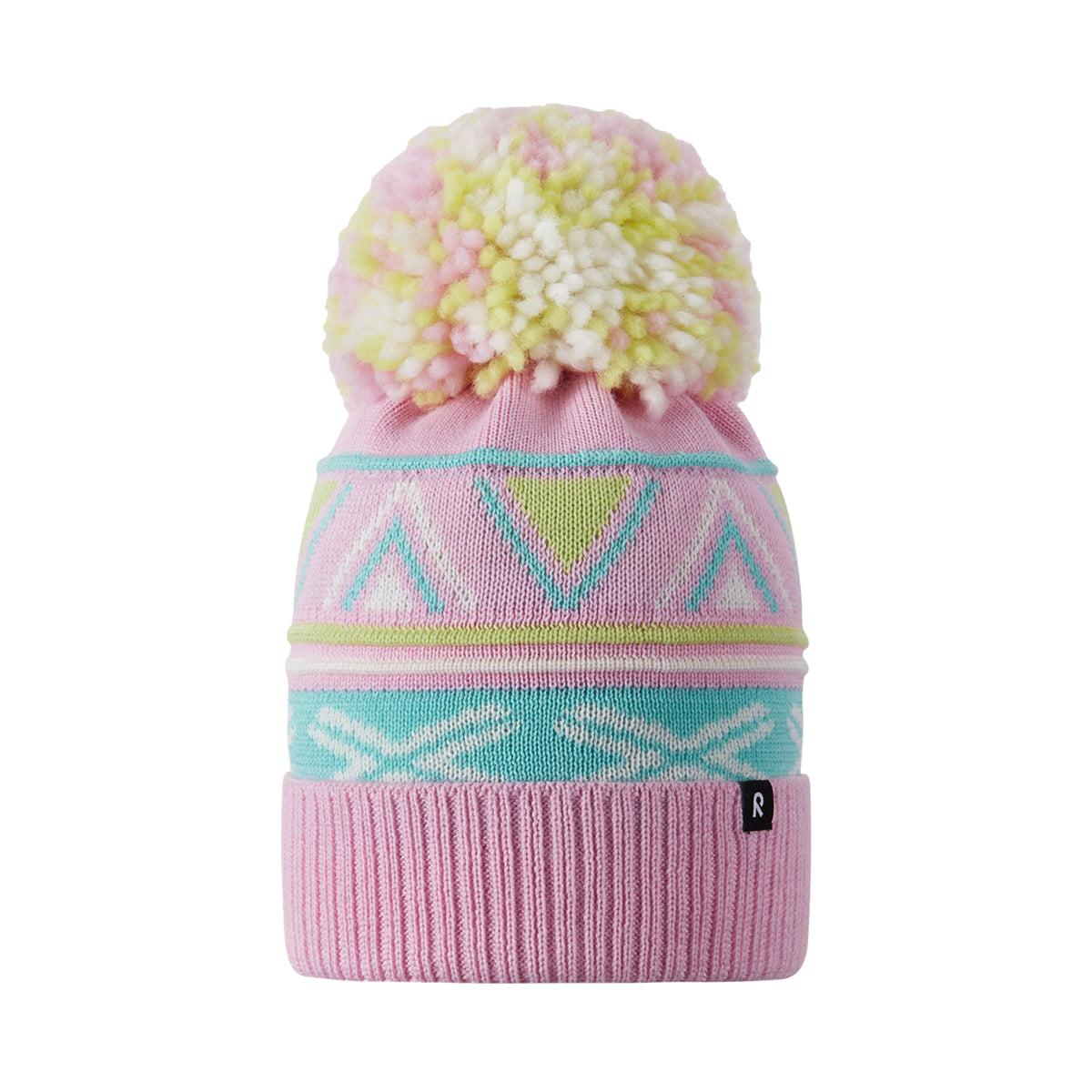 A pink knit beanie hat with a large pastel pom-pom on top, featuring geometric patterns in turquoise, lime green, and white, and a ribbed cuff with a small black logo tag.