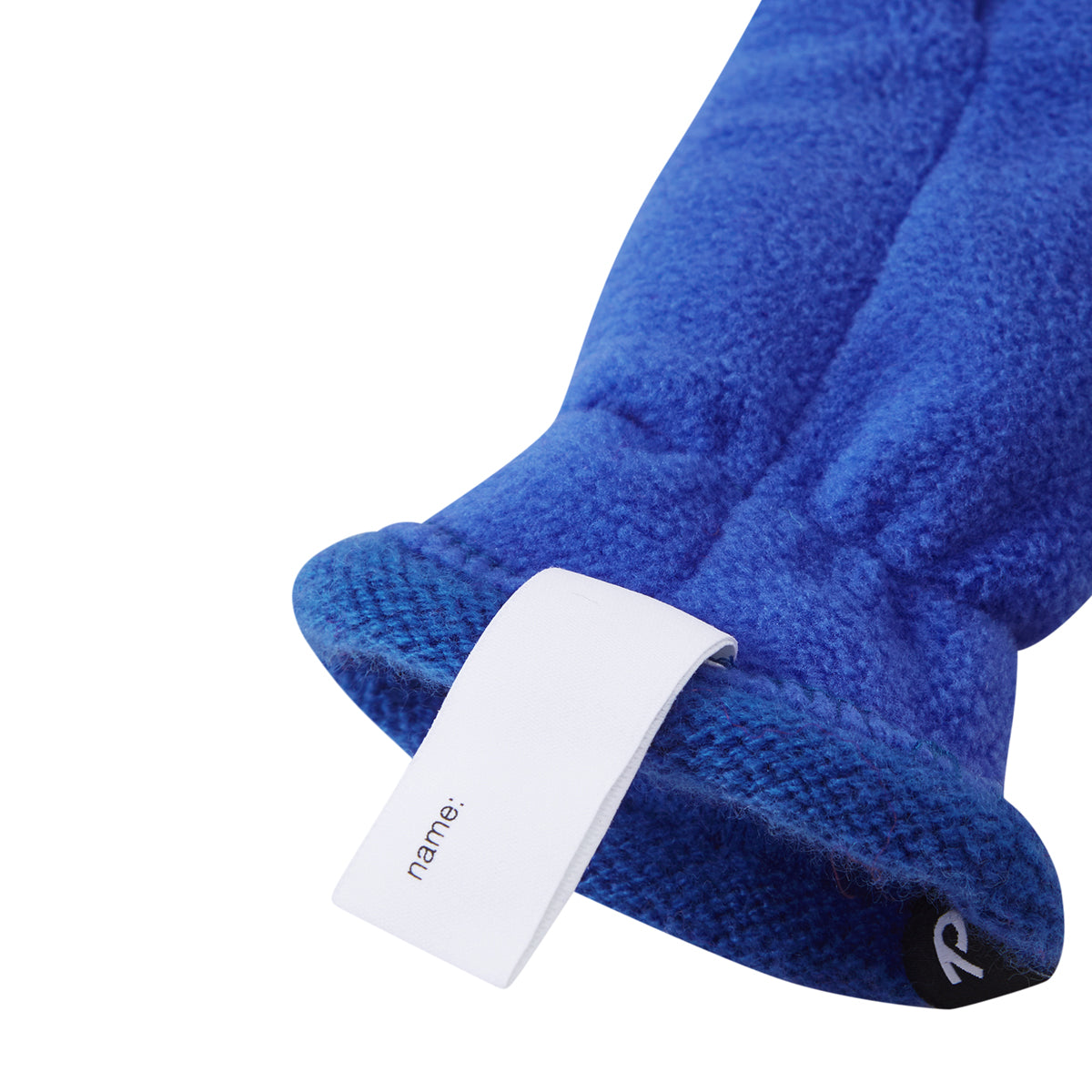 A close-up of a blue plush fleece sleeve or pouch with a white fabric tag printed with the name 'name:' and a small black circular logo with a white letter 'R' on a white background.