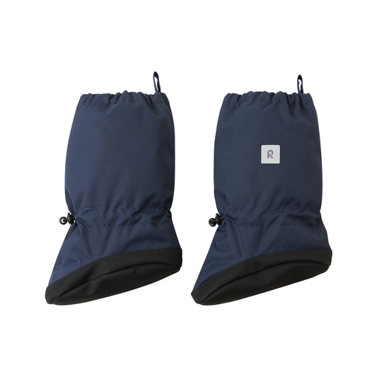 A pair of navy blue baby booties with black sole shown against a plain white background. One has a small white square logo patch with a black letter 'R'.