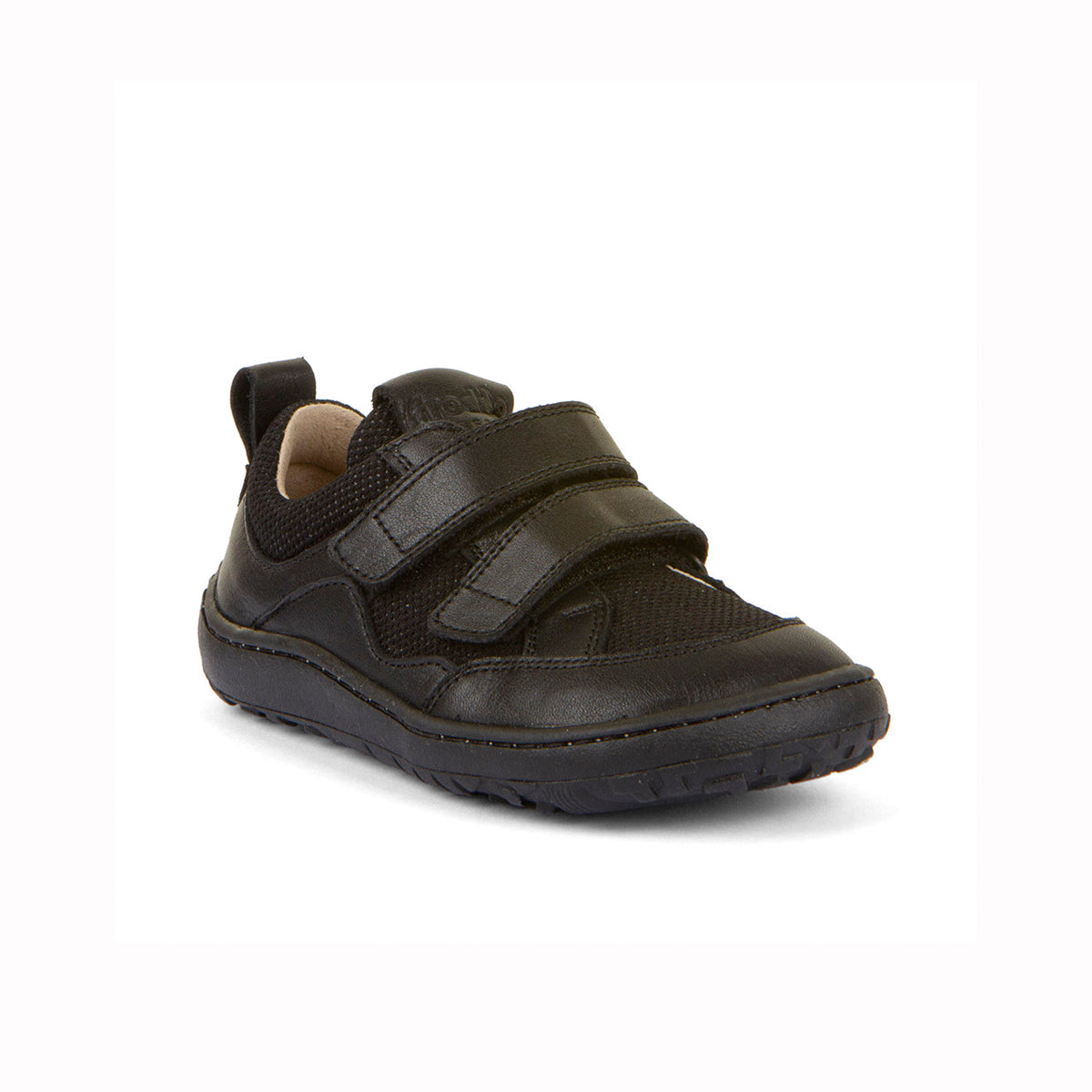 A black children's slip-on shoe with two hook-and-loop straps, a textured sole, and a pull tab on the heel, shown against a plain white background.