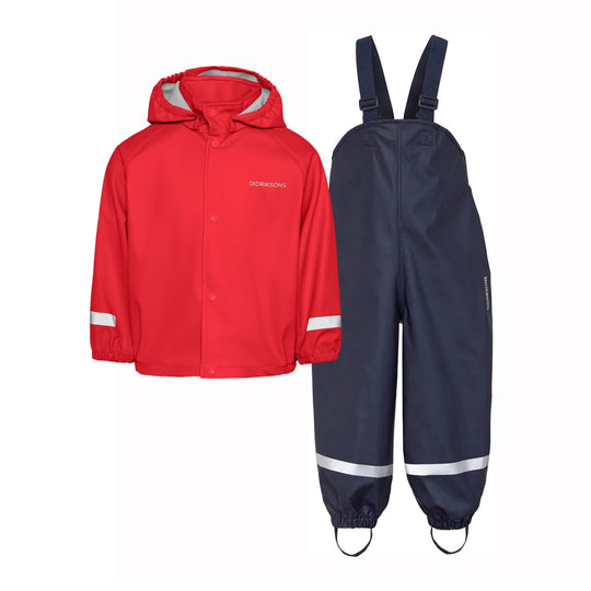 A children's two-piece waterproof suit set consisting of a bright red hooded jacket with reflective silver stripes on the sleeves and a pair of navy blue bib overalls with matching reflective silver stripes near the ankles, shown against a plain white background.