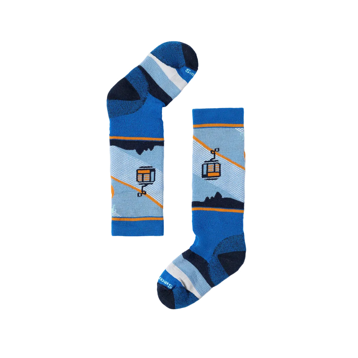 A pair of blue patterned kids ski socks displayed flat against a light gray background. The socks feature a cable car and mountain landscape design in shades of blue, navy, light blue, and orange.