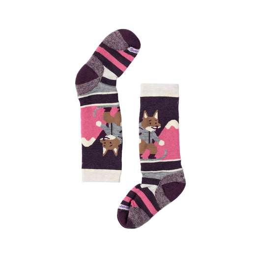 A pair of patterned girls ski socks displayed flat against a light gray background. The socks feature a dark purple base with pink and gray stripes, a cartoon dog graphic, and white ribbed cuffs.