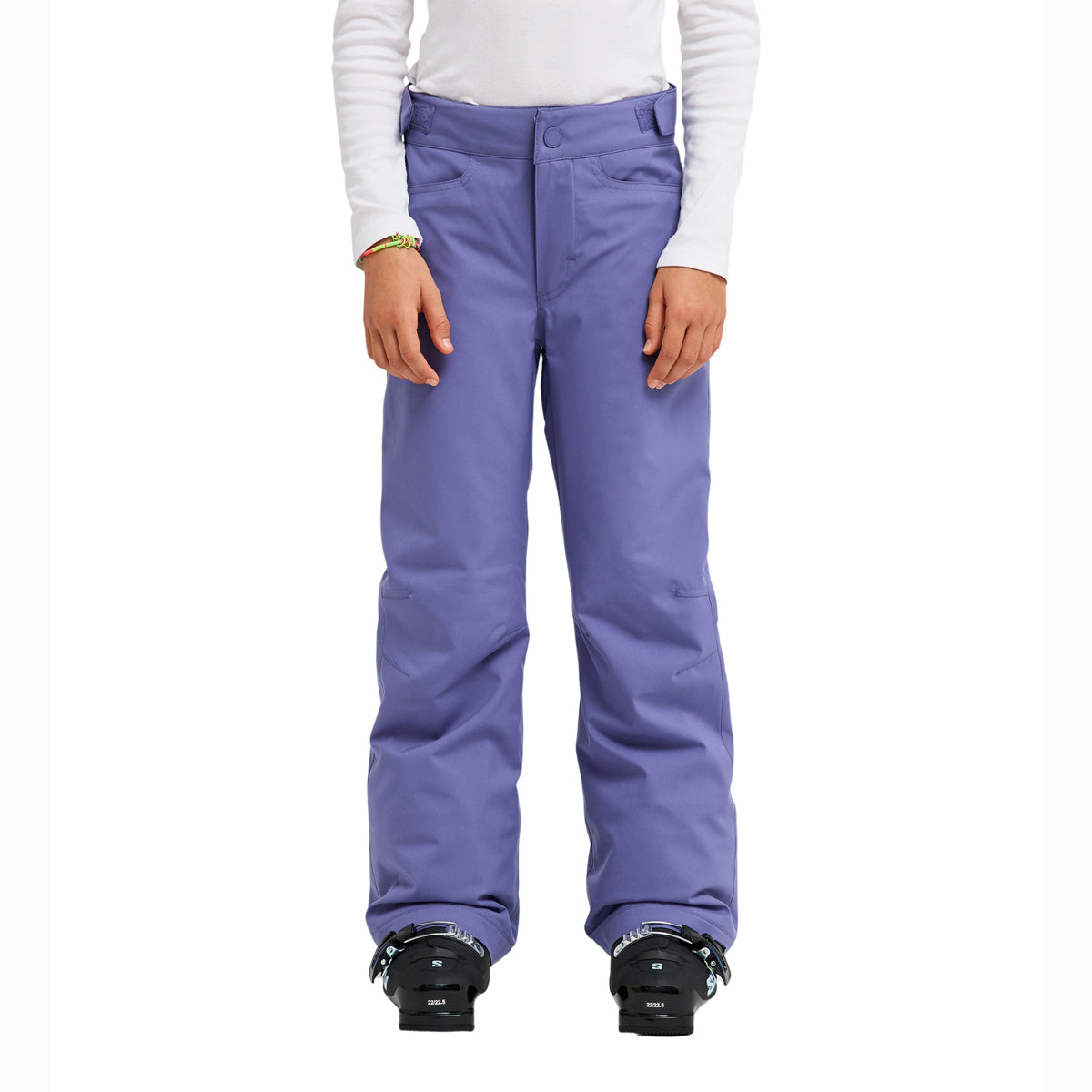A model from the waist down wearing a pair of purple snow pants with black snow boots, a white long-sleeve shirt, and a green bracelet, set against a plain white background.