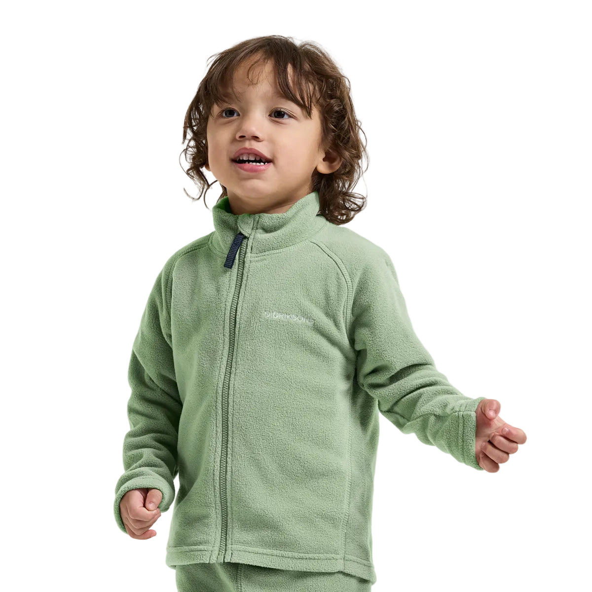 Child wearing a green fleece jacket on a white background