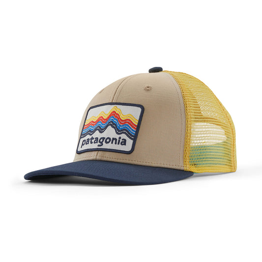 Kids trucker cap from Patagonia in navy and yellow with Patagonia logo on the front
