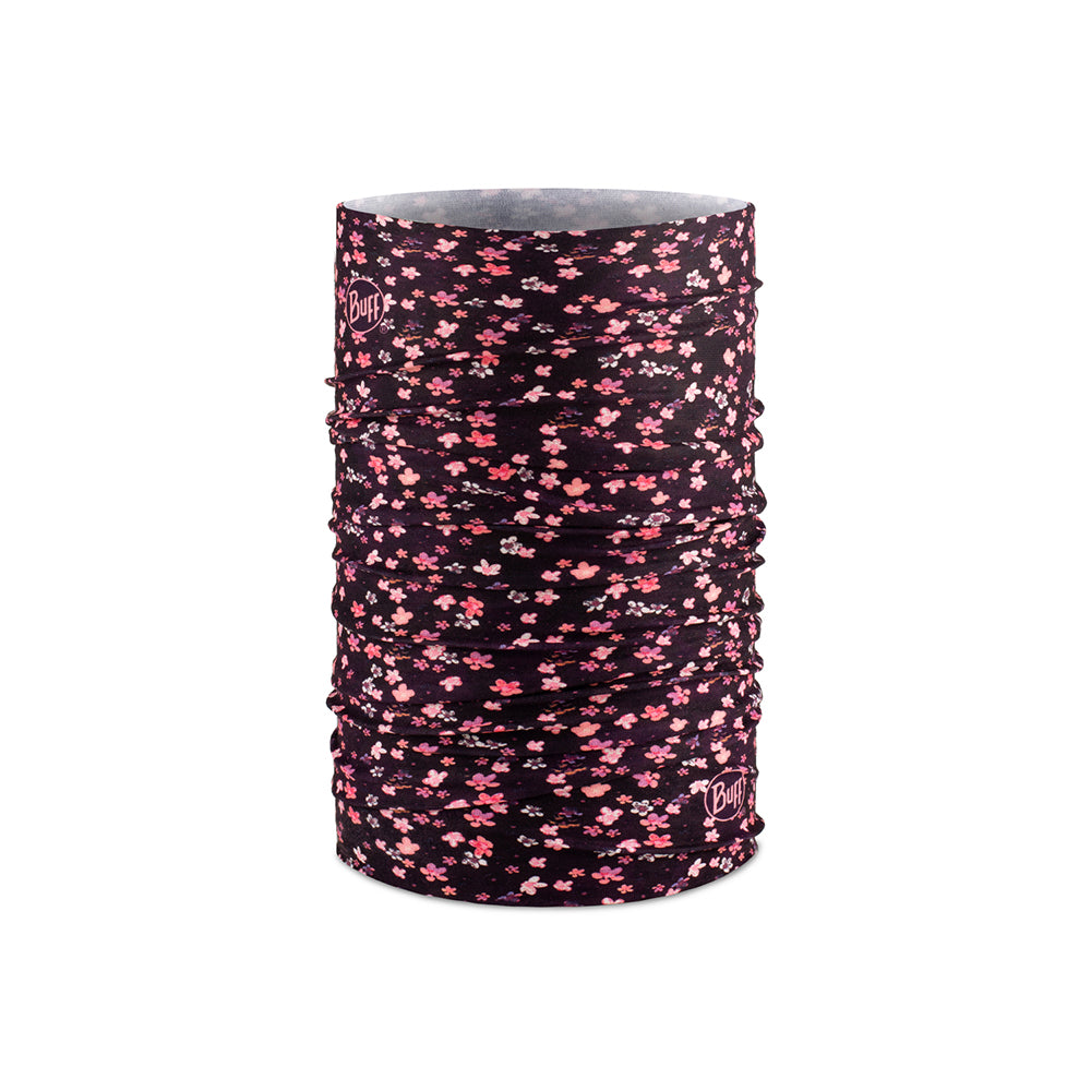 Buff kids neck warmer with small pink flower pattern on purple background